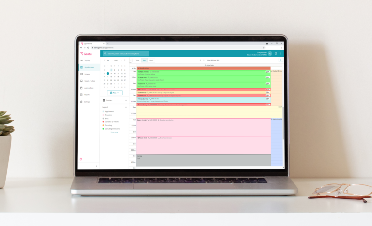 Gentu practice management software on laptop